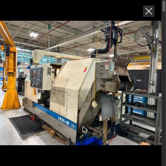 2001 Okuma LB35 II M Heavy-Duty CNC Lathe Royal Filtermist Chip Conveyor