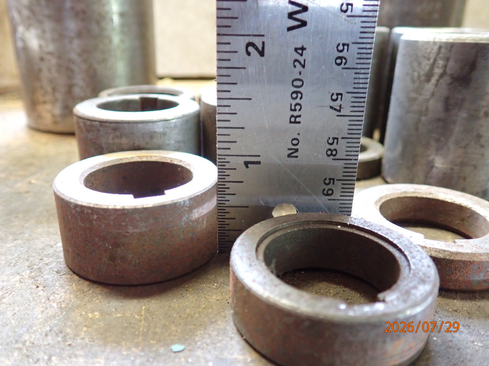 LOT 62: PILE OF HORIZONTAL MILLING MILL MACHINE SPINDLE SPACERS 1″ & 1-1/4″ DIA