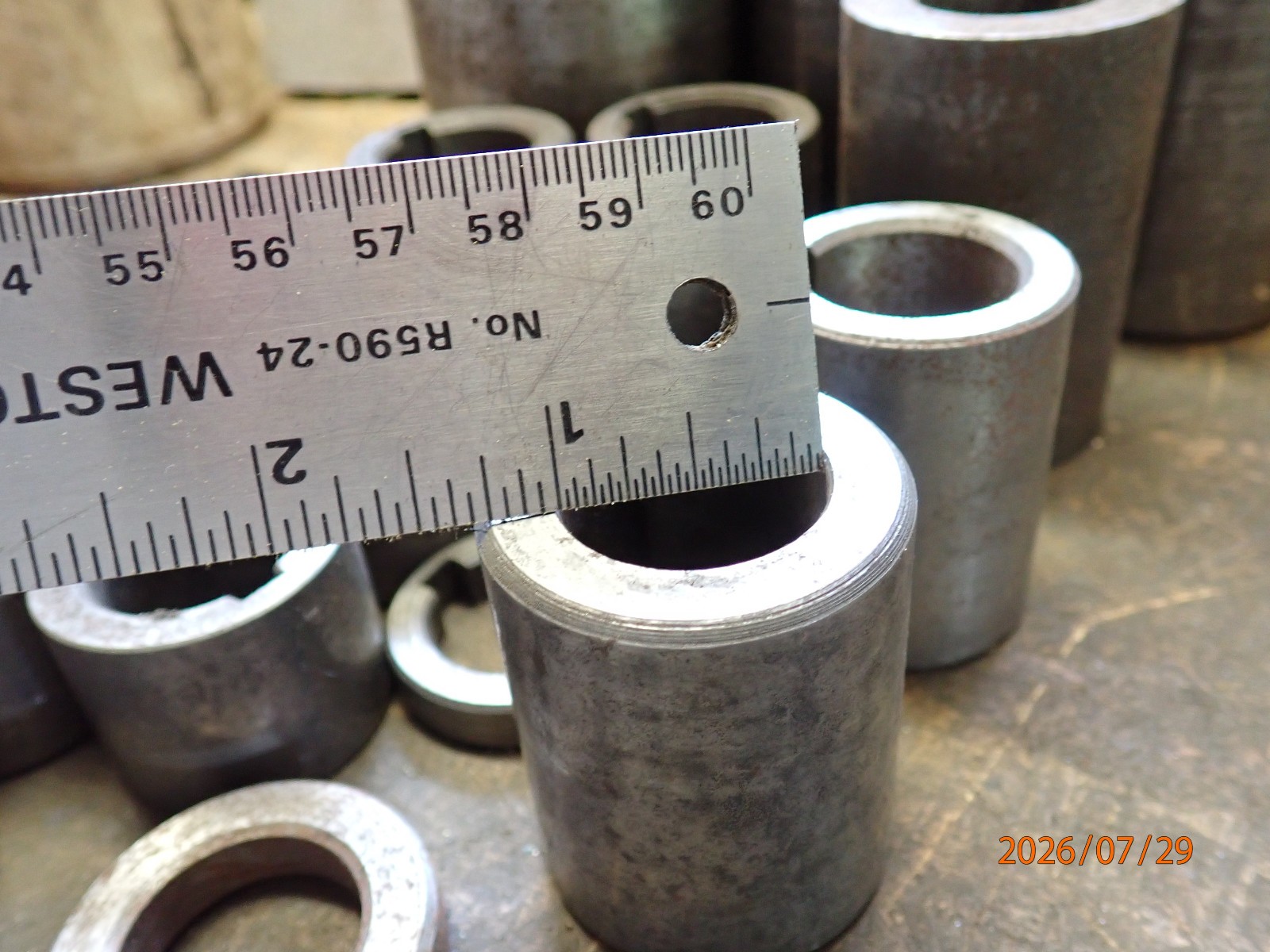 LOT 62: PILE OF HORIZONTAL MILLING MILL MACHINE SPINDLE SPACERS 1″ & 1-1/4″ DIA