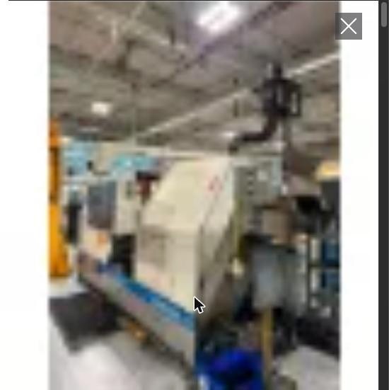 2001 Okuma LB35 II M Heavy-Duty CNC Lathe Royal Filtermist Chip Conveyor
