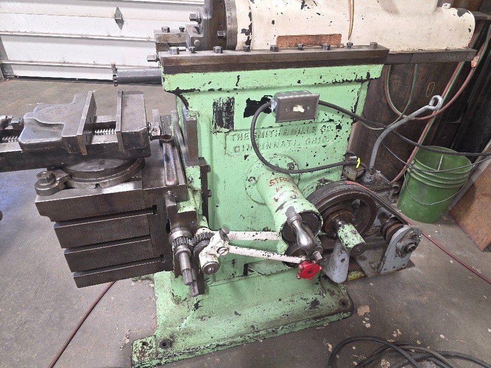 Smith and Mills 12″ shaper with nice vice and one tool holder. 110V.