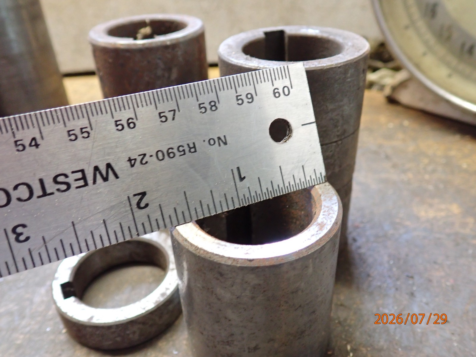 LOT 62: PILE OF HORIZONTAL MILLING MILL MACHINE SPINDLE SPACERS 1″ & 1-1/4″ DIA