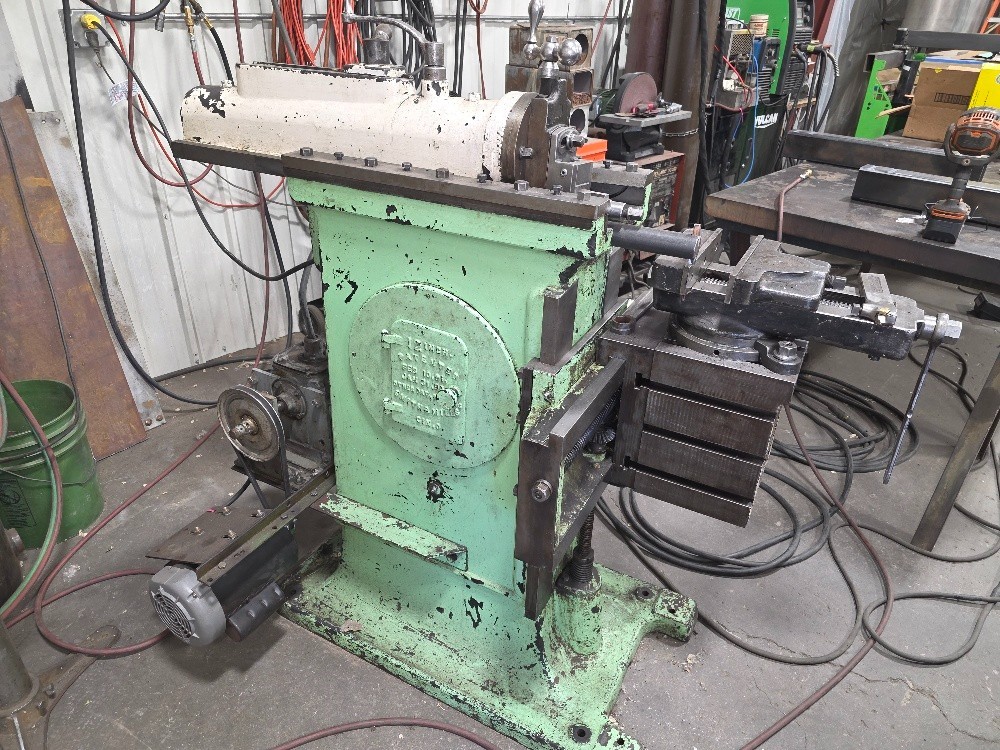Smith and Mills 12″ shaper with nice vice and one tool holder. 110V.