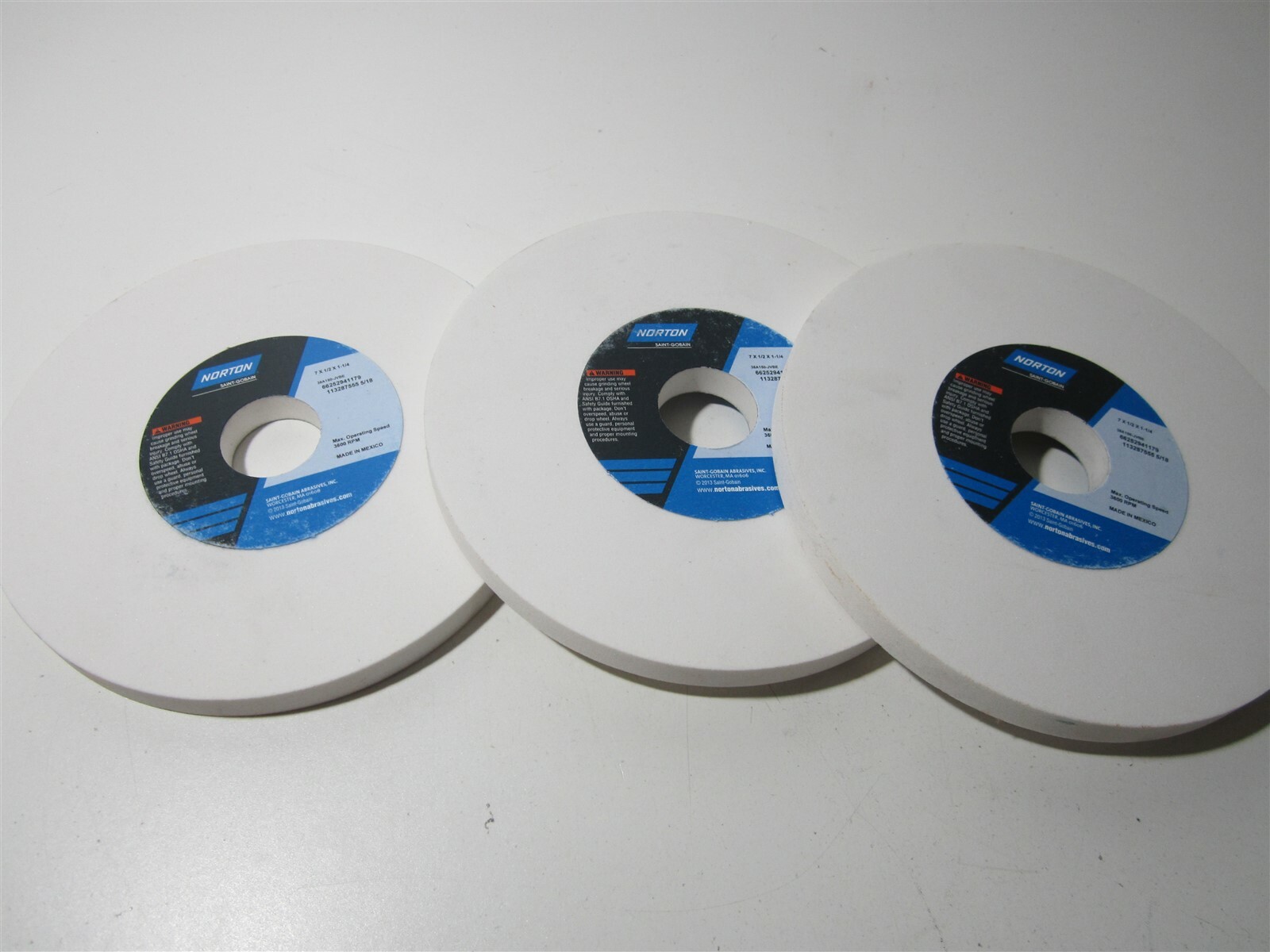 Norton 7″ Dia x 1-1/4″ Hole x 1/2″ Thick 3600RPM 150G Grinding Wheel (Lot of 3)