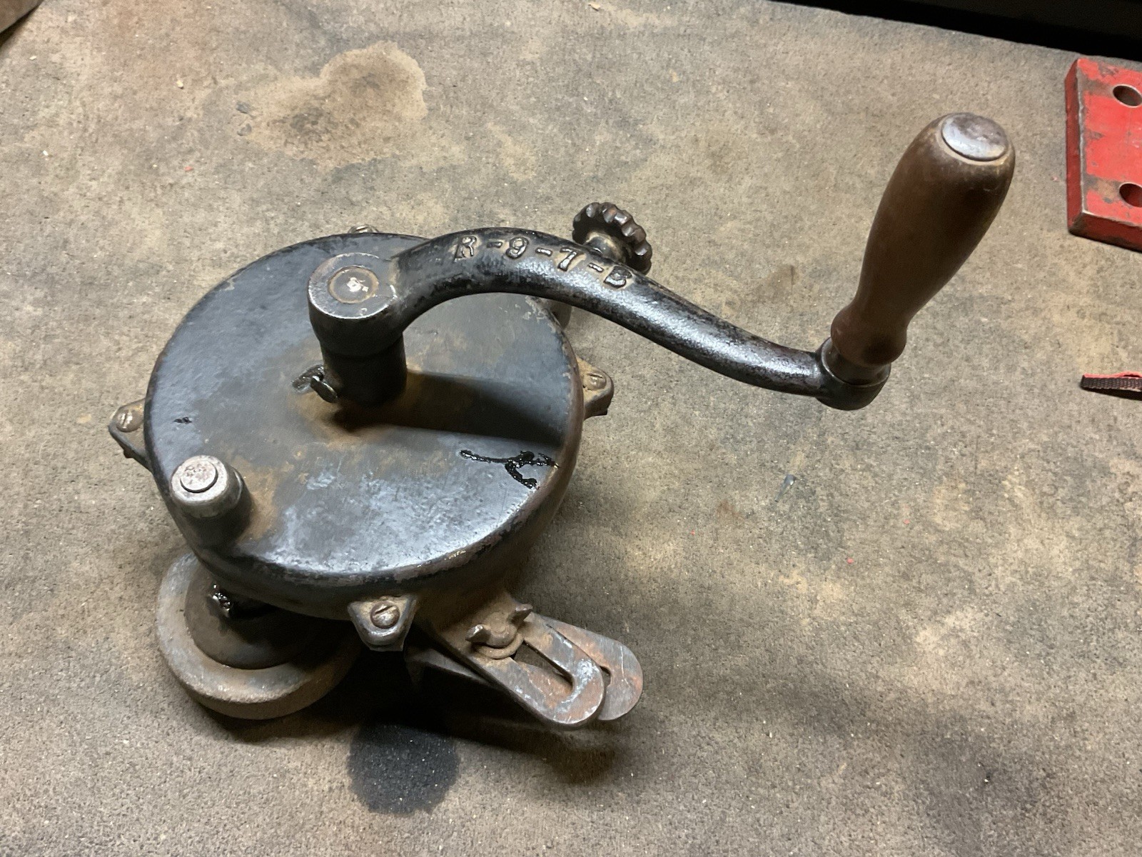 Hand crank bench grinder clamps to workbench
