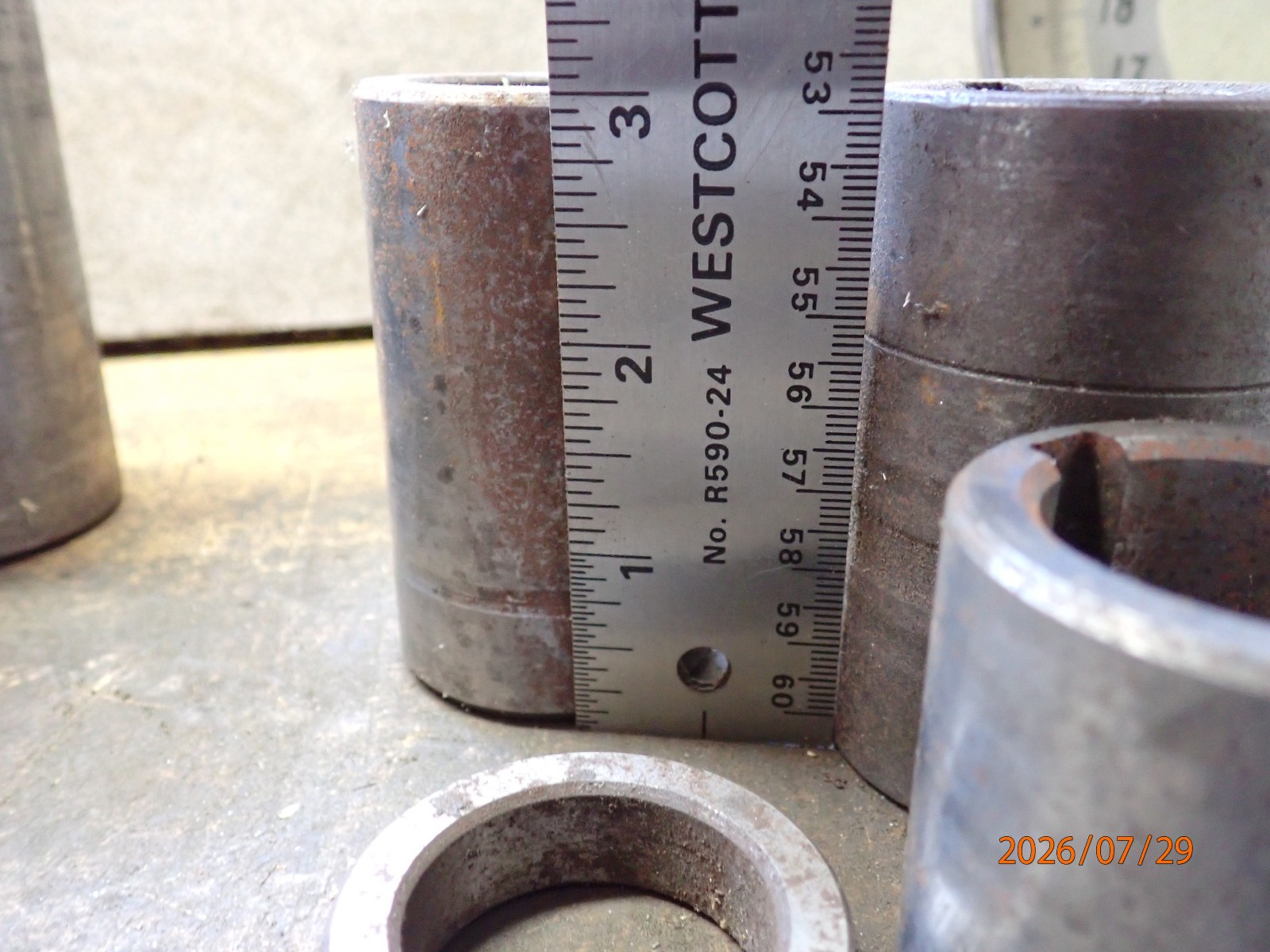 LOT 62: PILE OF HORIZONTAL MILLING MILL MACHINE SPINDLE SPACERS 1″ & 1-1/4″ DIA