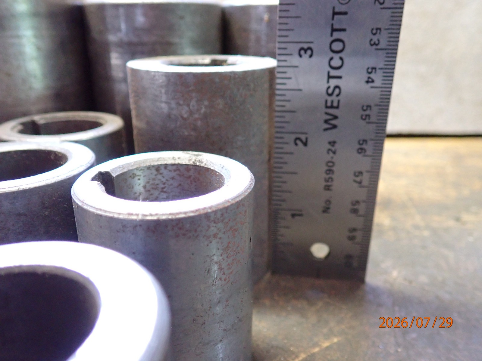 LOT 62: PILE OF HORIZONTAL MILLING MILL MACHINE SPINDLE SPACERS 1″ & 1-1/4″ DIA