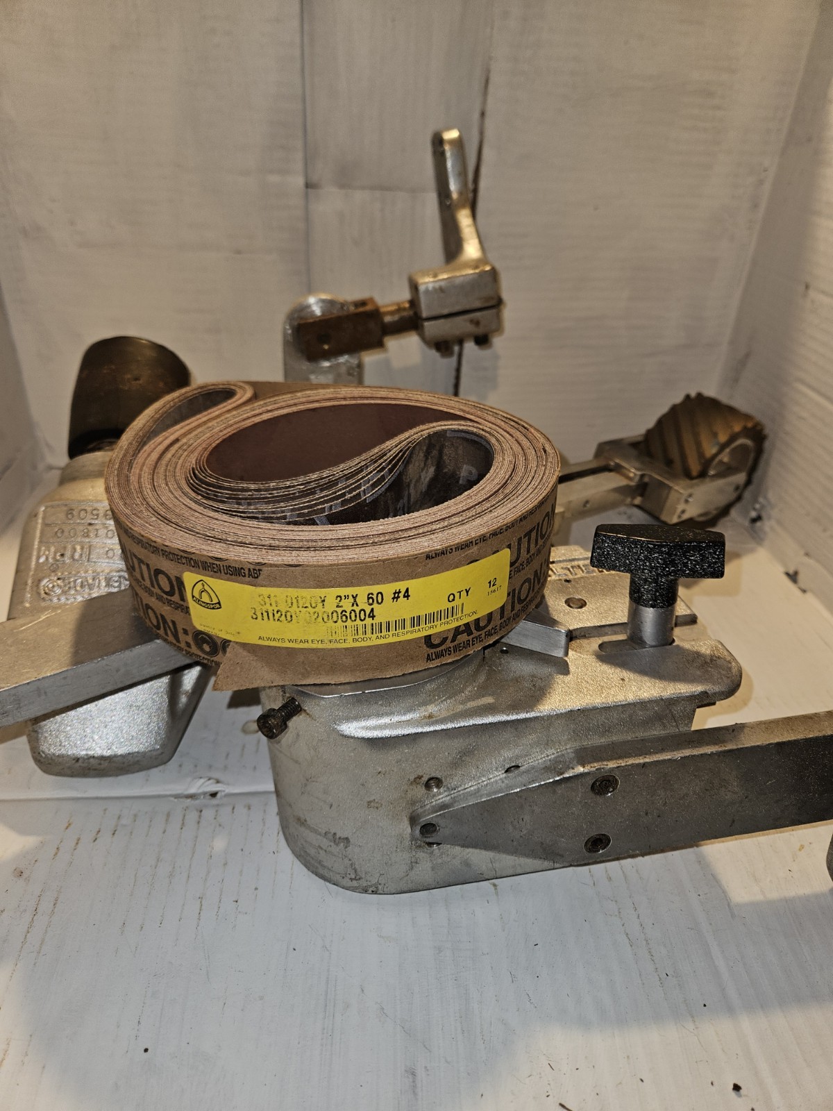 Dynabrade 11477 Dynabelter 2” belt sander w stand and 60 ” sanding belts