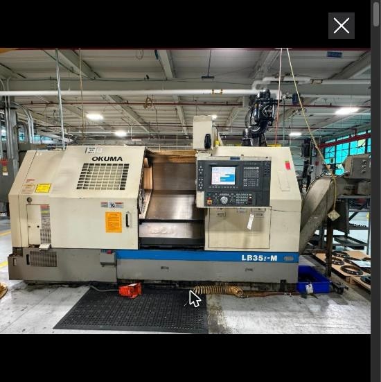 2001 Okuma LB35 II M Heavy-Duty CNC Lathe Royal Filtermist Chip Conveyor